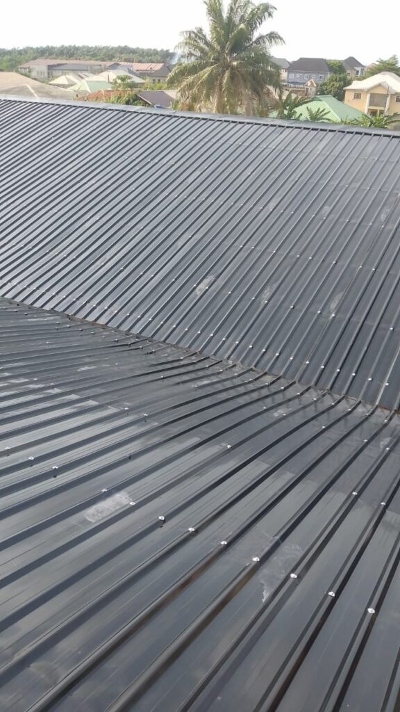 Close-up of grey corrugated aluminium roof sheets by Blessed Joe Aluminium.