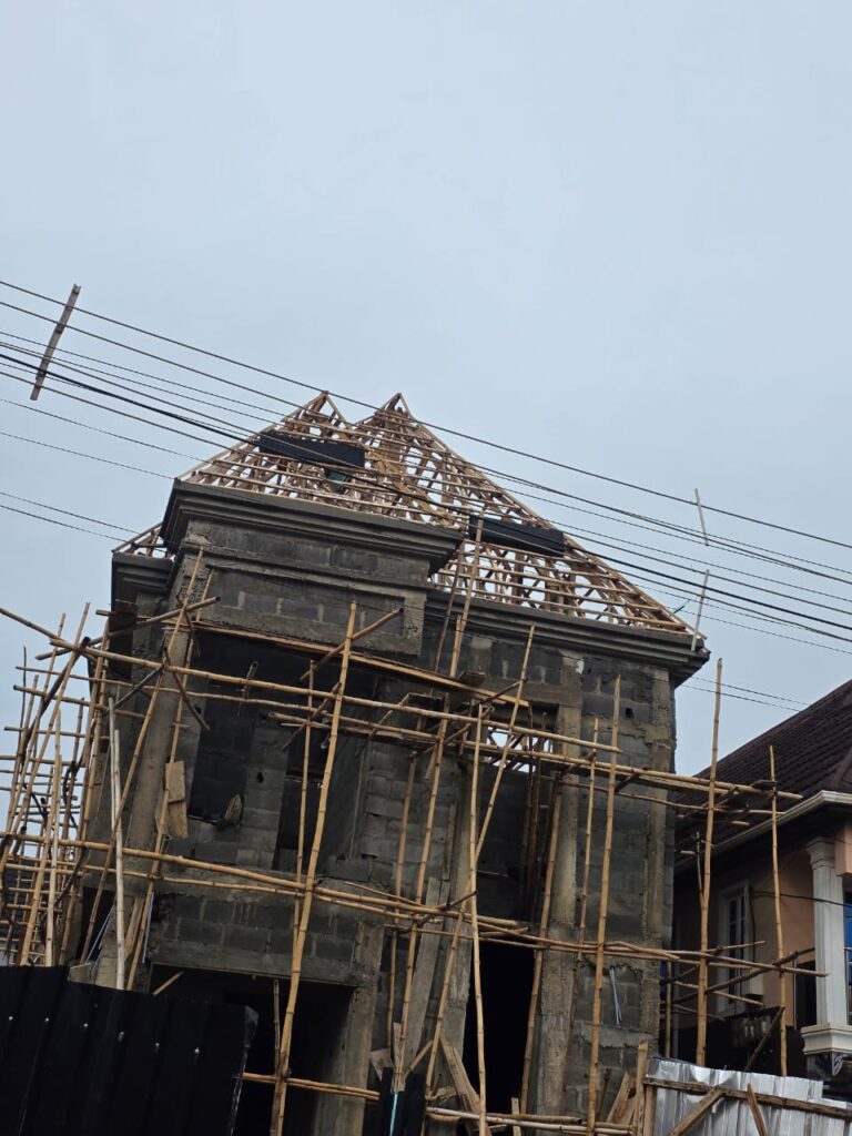 Wooden roof framework prepared for aluminium roofing by Blessed Joe Aluminium.